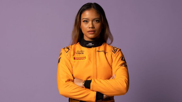 Bianca Bustamante in her race suit