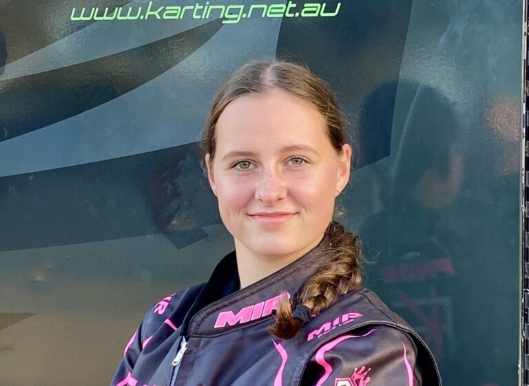 Charlotte Page in her race suit