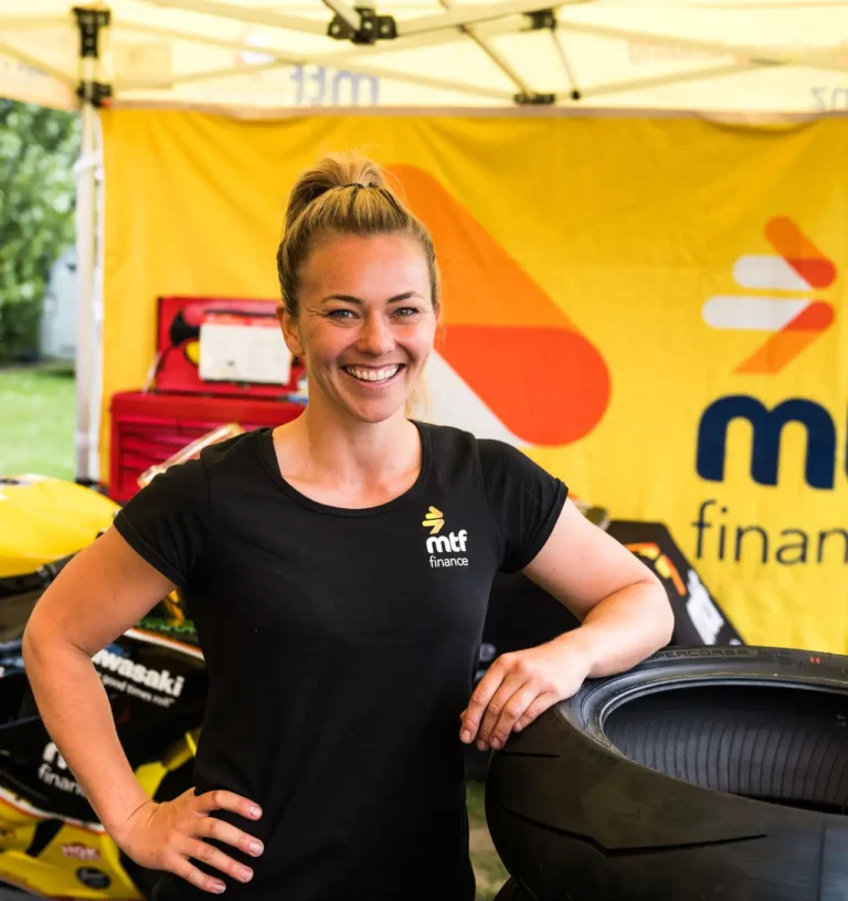 Avalon Lewis in her race suit