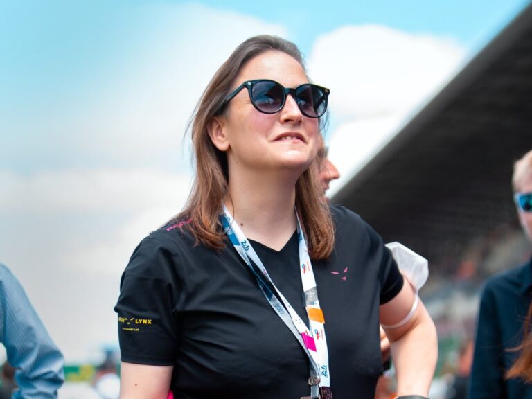 Deborah Mayer in her race suit