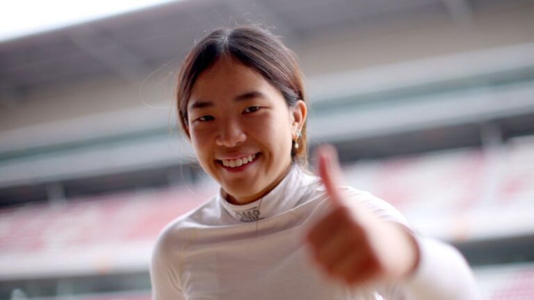 Chloe Chong in her race suit