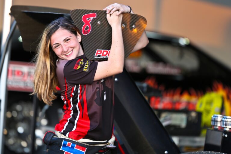 Camrie Caruso in her race suit