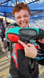 Aubrey Credarolli in her race suit