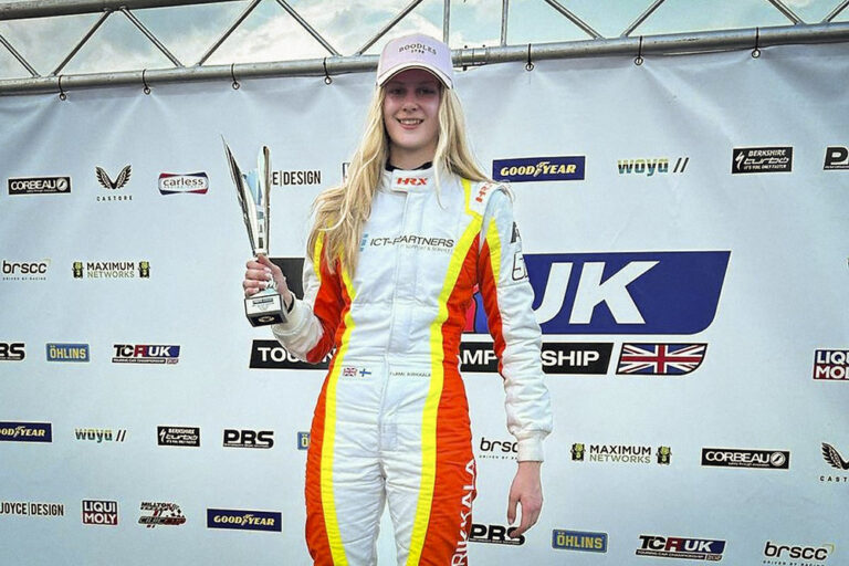 Flame Airikkala in her race suit