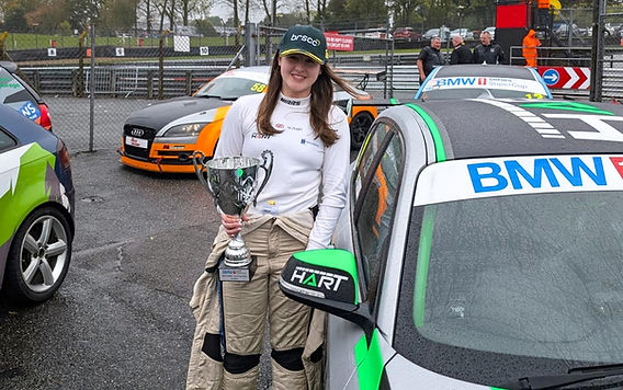 Millie Hart in her race suit