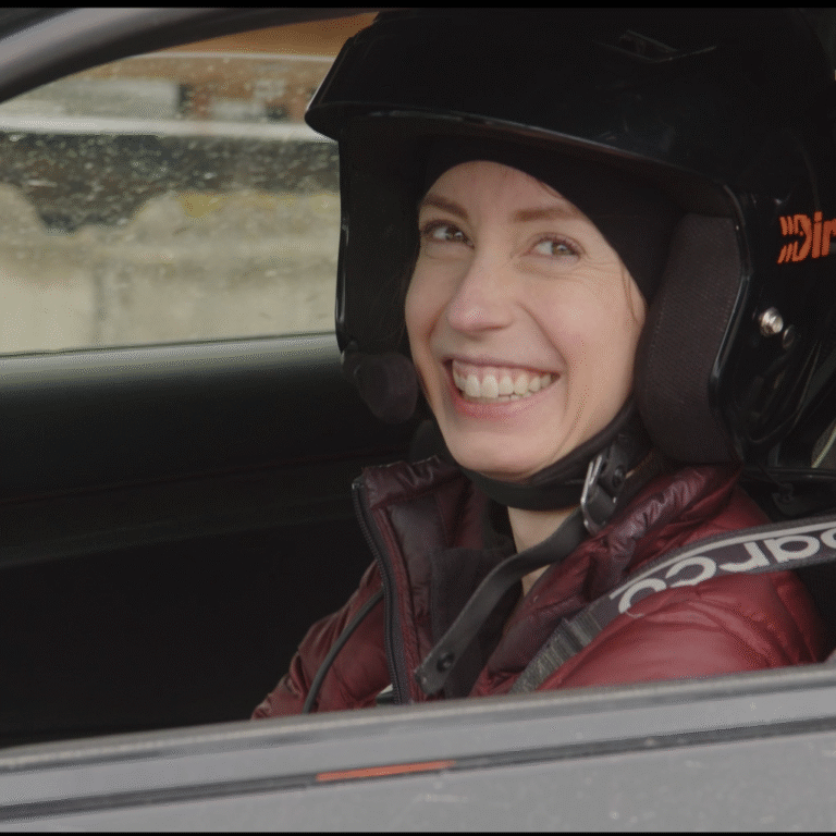 Kelly Conroy in her race suit