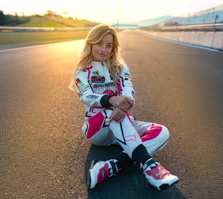 Happinessa in her race suit