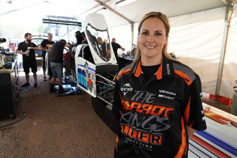 Kelly Bettes in her race suit